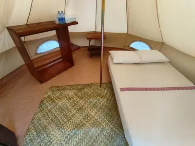 Cama o camas de una habitación en Glamping Campamento Cuetzalan