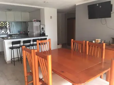 Una cocina o zona de cocina en Cómodo departamento en Costa Azul.