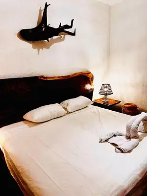 Cama o camas de una habitación en La Casa de Colores Ocean View