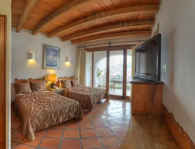 Una televisión o centro de entretenimiento en Casona Colonial de la Misión
