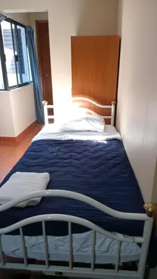 Cama o camas de una habitación en COYOACAN ALCALDIA CERCA DE LA UNAM GUEST House AMATL