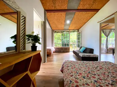 Cama o camas de una habitación en Casa Encino con alberca climatizada en Tepoztlán