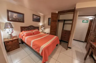 Cama o camas de una habitación en Hotel Casa Yunenisa