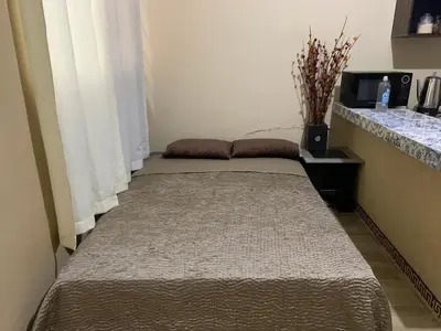 Cama o camas de una habitación en Departamento cómodo-equipado cerca del aeropuerto