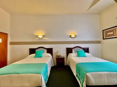 Cama o camas de una habitación en Hotel Alifer