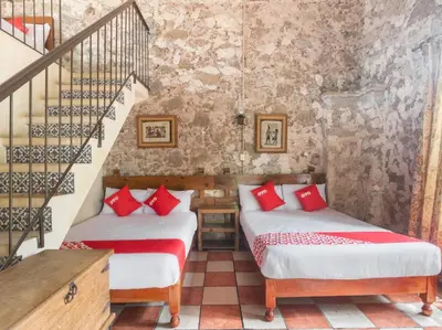 Cama o camas de una habitación en Rancho Hotel El Carmen