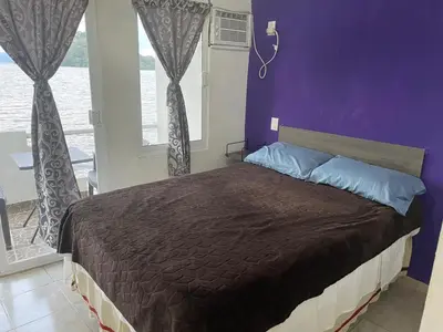 Cama o camas de una habitación en La Cabaña del Lago