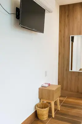 Una televisión o centro de entretenimiento en Condominio Alegre Amanecer