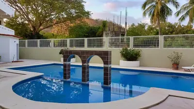 Piscina en o cerca de Condominio Alegre Amanecer