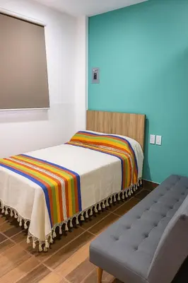 Cama o camas de una habitación en Condominio Alegre Amanecer