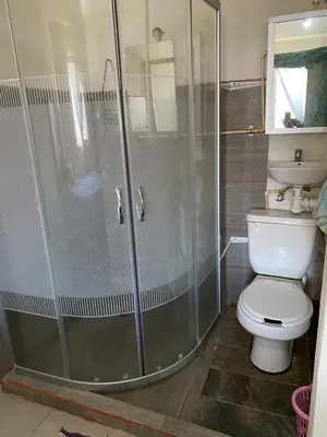 Un baño de Habitación privada Leonera