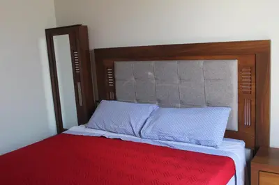 Cama o camas de una habitación en Suites Independencia Oaxaca