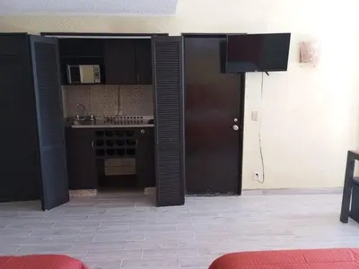 Una cocina o zona de cocina en Departamento con hermosa vista al mar y acceso a playa, 2 albercas