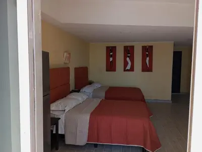Cama o camas de una habitación en Departamento con hermosa vista al mar y acceso a playa, 2 albercas