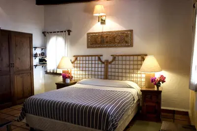 Cama o camas de una habitación en La Casa del Guamúchil