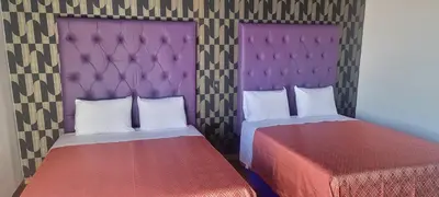 Cama o camas de una habitación en HOTEL MAQUIAVELO SOLO ADULTOS