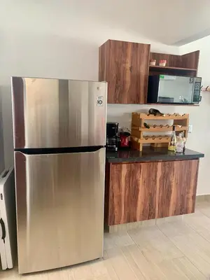 Una cocina o zona de cocina en Departamento de Lujo & Club de Playa