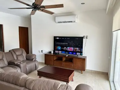Una televisión o centro de entretenimiento en Vidamar Refugio Costero / Zona Diamante