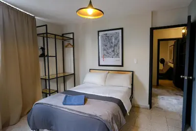 Cama o camas de una habitación en Comfortable One Bedroom Apartment Casa Icacos # 0