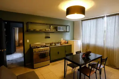 Una cocina o zona de cocina en Comfortable One Bedroom Apartment Casa Icacos # 0
