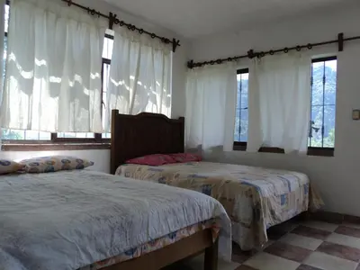 Cama o camas de una habitación en Posada Xamicalli