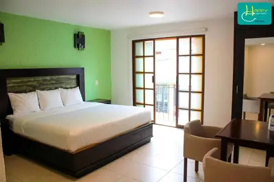 Cama o camas de una habitación en Happy Express Hotel
