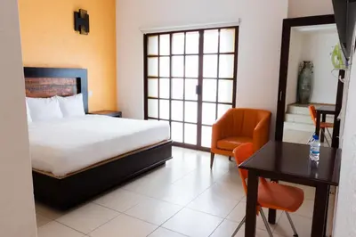 Cama o camas de una habitación en Happy Express Hotel