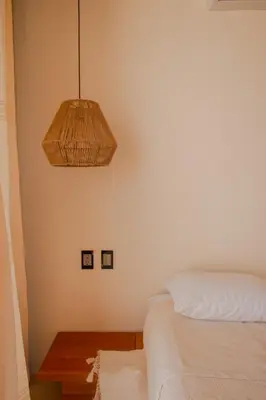 Cama o camas de una habitación en CASA RAFFAELLA Modern apartments with AC Pool Starlink