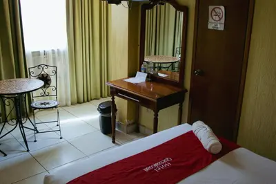 Cama o camas de una habitación en Hotel Quetzalcóatl