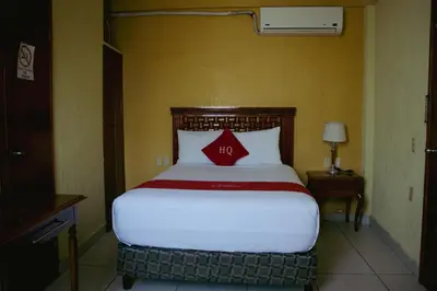 Cama o camas de una habitación en Hotel Quetzalcóatl
