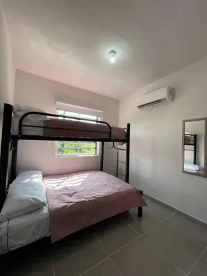 Cama o camas de una habitación en Increíble Casa con alberca y club de playa