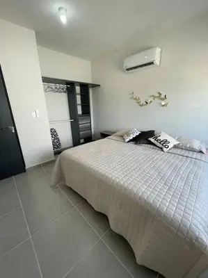 Cama o camas de una habitación en Increíble Casa con alberca y club de playa