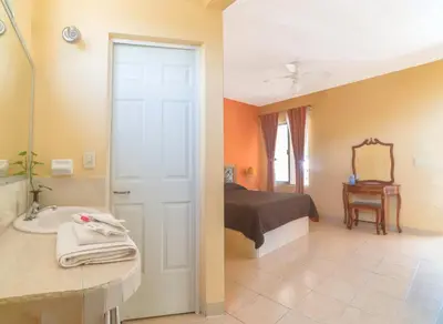 Cama o camas de una habitación en Hotel del Rio