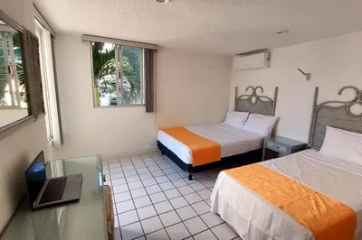 Cama o camas de una habitación en Condominio en zona turística