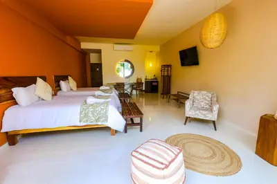 Cama o camas de una habitación en Hotel BG Wellness & Spa Boca del Río Veracruz