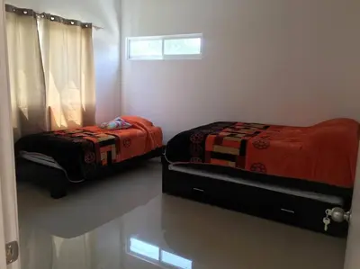 Cama o camas de una habitación en Residencia en Oaxtepec