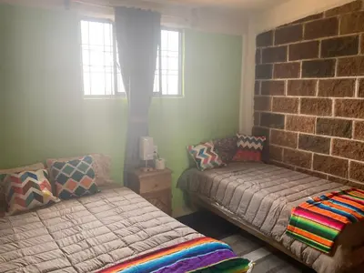 Cama o camas de una habitación en “Casa de campo Miyana”