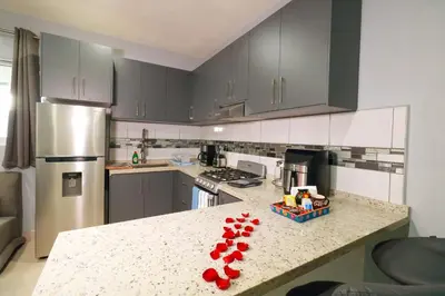 Una cocina o zona de cocina en Hermoso Apartamento para 2 personas, a 10 min en vehículo del Zócalo de Oaxaca