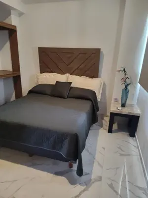 Cama o camas de una habitación en Sol y mar