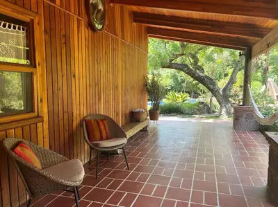 Zona de estar de Casa Nora Malinalco huerto con alberca climatizada