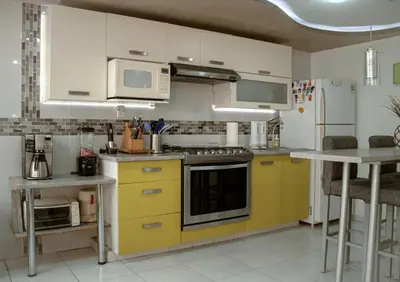 Una cocina o zona de cocina en Departamento céntrico, amplio y nuevo cerca del Aeropuerto y GNP-Foro sol