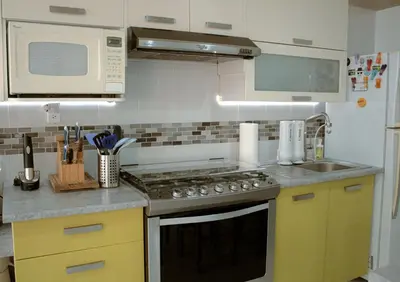 Una cocina o zona de cocina en Departamento céntrico, amplio y nuevo cerca del Aeropuerto y GNP-Foro sol