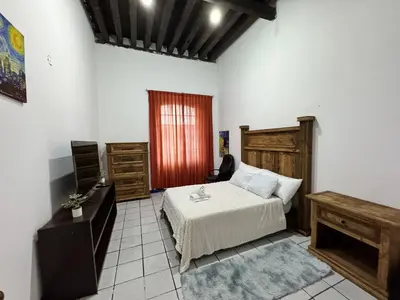 Cama o camas de una habitación en Hostal puebla