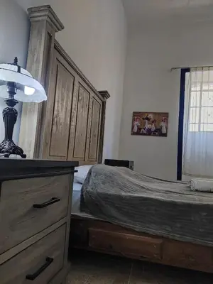 Cama o camas de una habitación en Hostal puebla