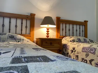 Cama o camas de una habitación en Hotel Maria Luisa