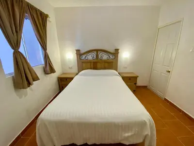 Cama o camas de una habitación en Hotel Maria Luisa