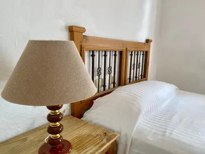 Cama o camas de una habitación en Hotel Maria Luisa