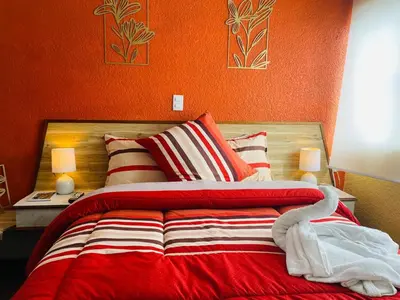Cama o camas de una habitación en Hotel Los Diamantes