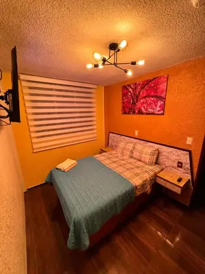 Cama o camas de una habitación en Hotel Diamantes