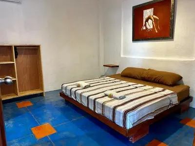 Cama o camas de una habitación en Hotel Manava